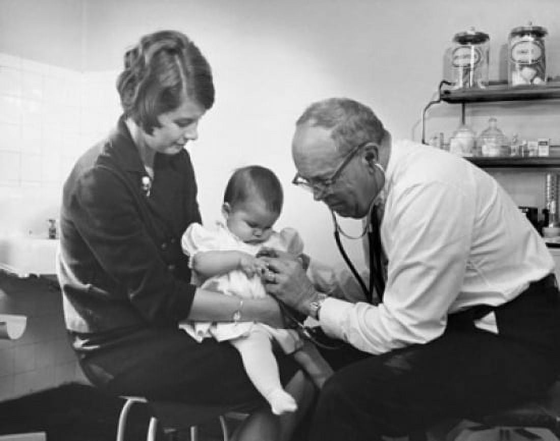 Pediatrician examining a baby girl with a stethoscope Canvas Art - (18 x 24)