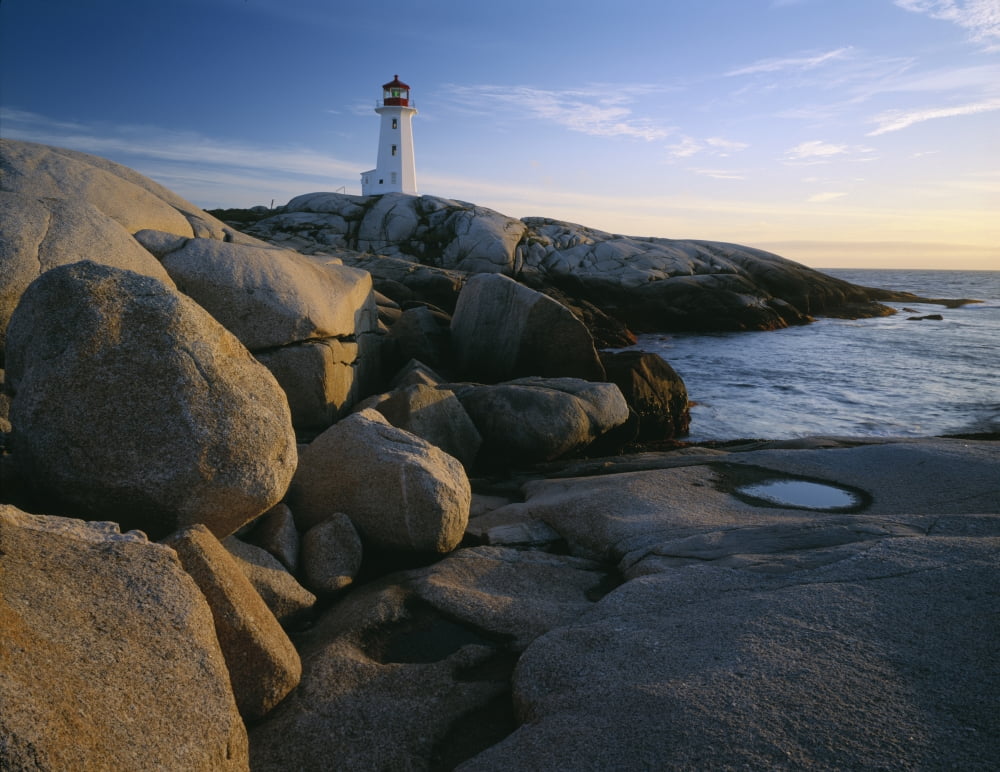 Peggys Cove Lighthouse in the evening on the Atlantic coast of Nova Scotia Canada Canvas Art - Panoramic Images (12 x 36)