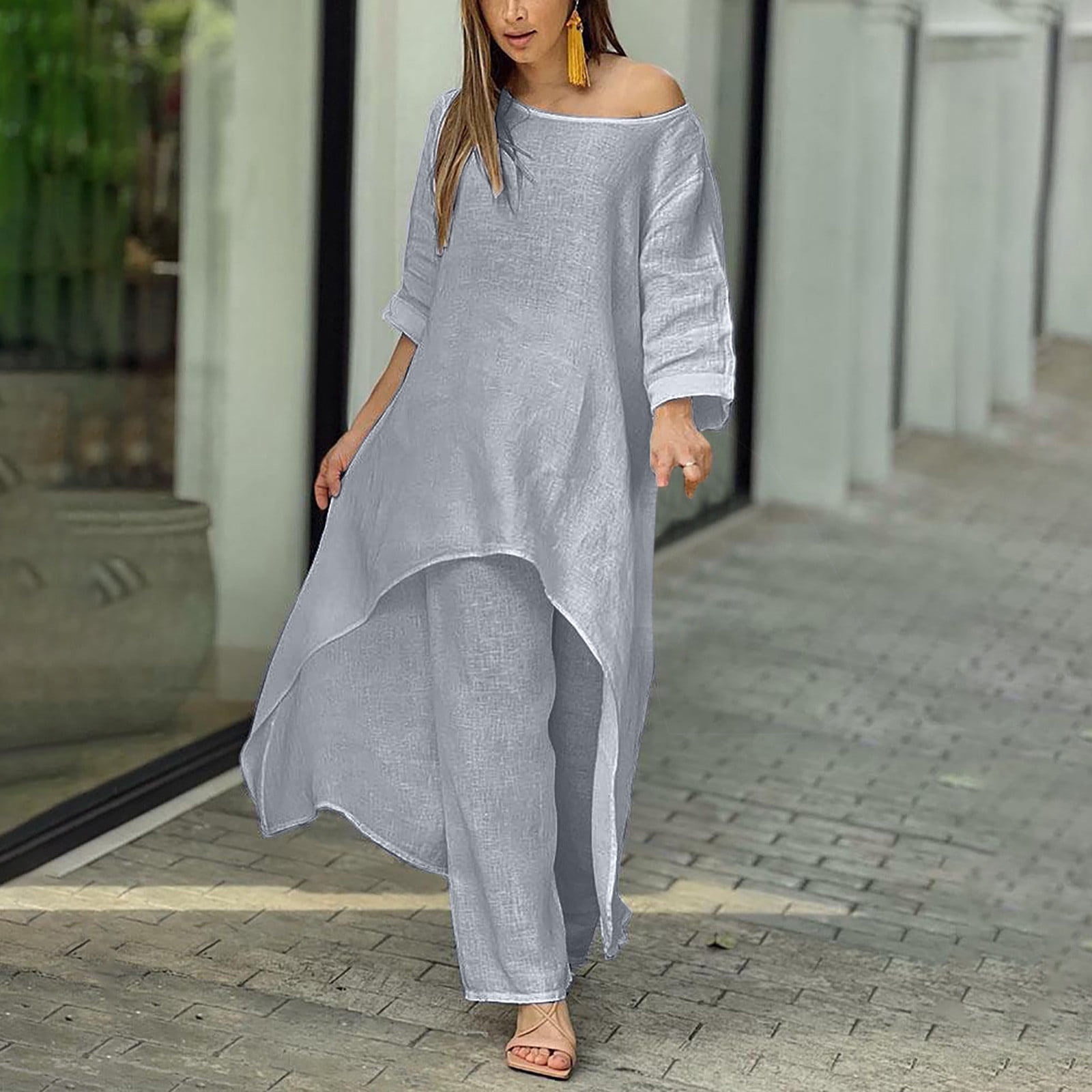 Long sleeve and slit design, along with casual wide-leg pants