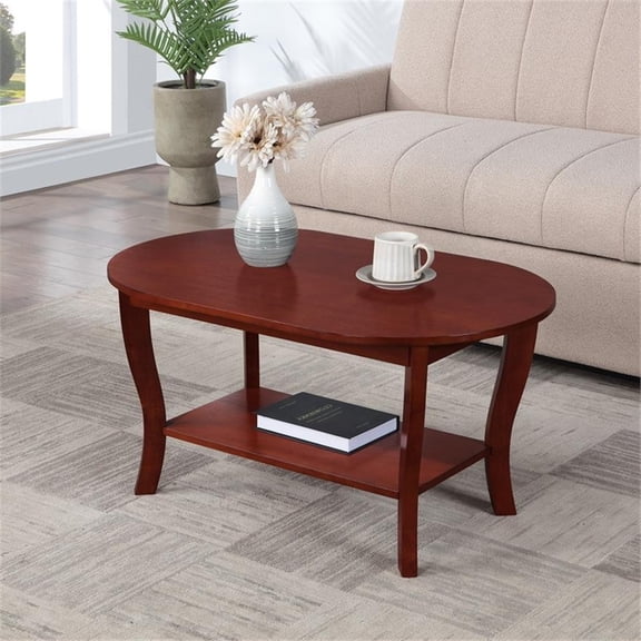 Pemberly Row Oval Coffee Table with Shelf in Mahogany Wood Finish