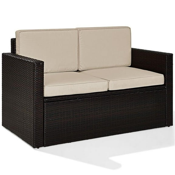 Pemberly Row Wicker Patio Loveseat In Brown with Sand Cushions