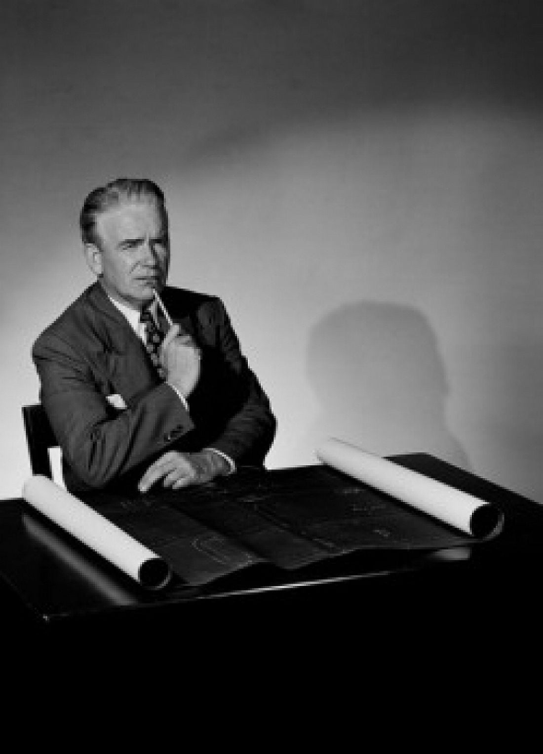 Pensive businessman smoking pipe in office Canvas Art - (24 x 36)