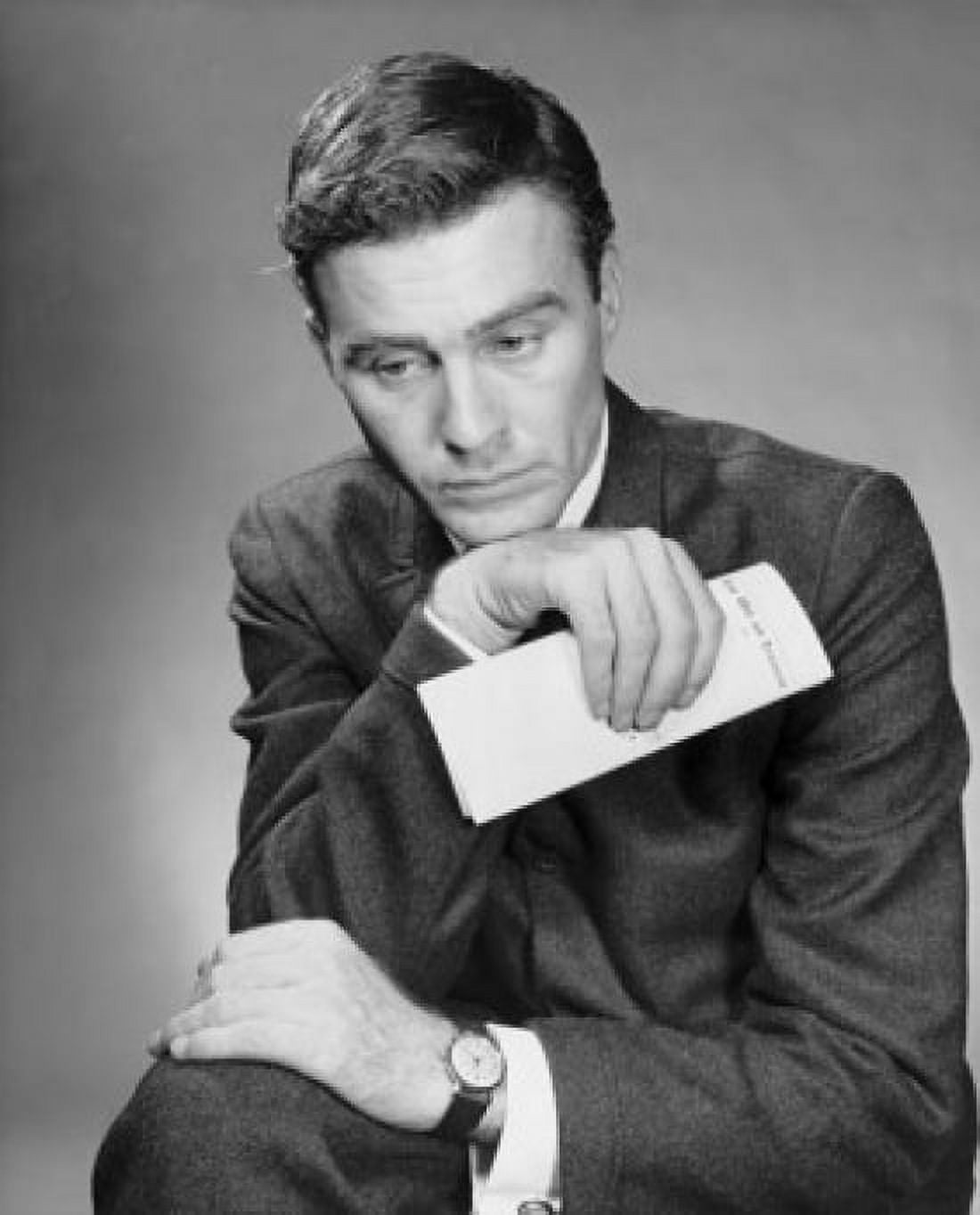 Pensive mid adult businessman holding document Canvas Art - (24 x 36)
