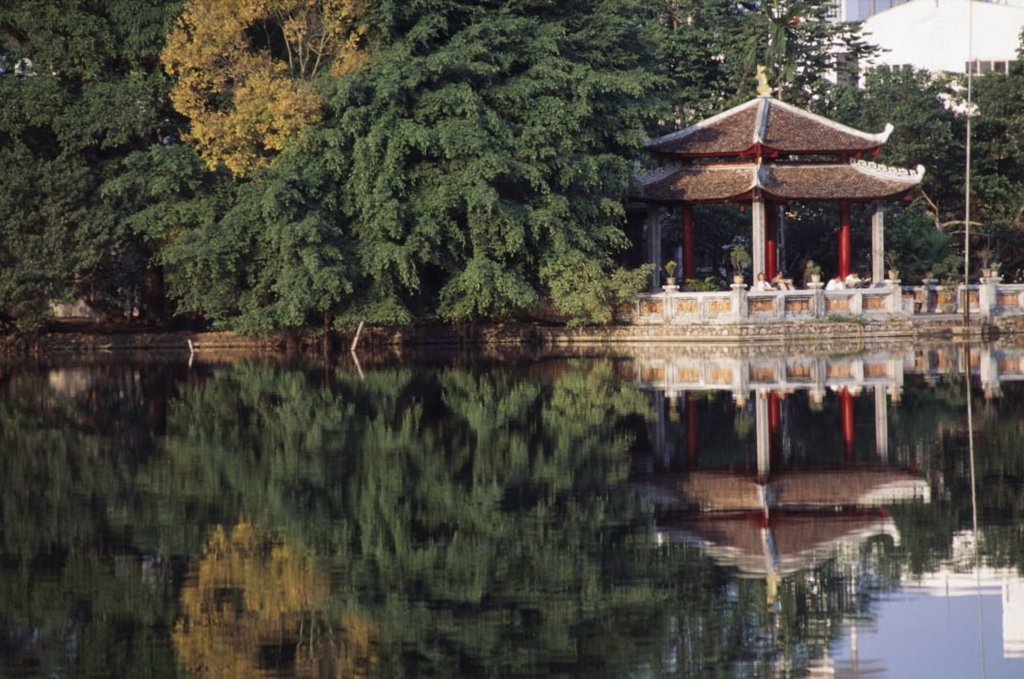 People Resting Under Pagoda On Hoan Kiem Lake Shore Canvas Art - Jim Holmes Design Pics (18 x 12)