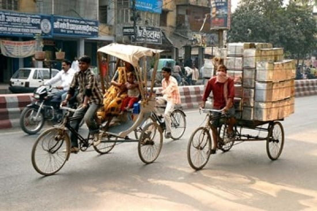 People and cargo move through streets via rickshaw Varanasi India Canvas Art - David Noyes DanitaDelimont (12 x 17)