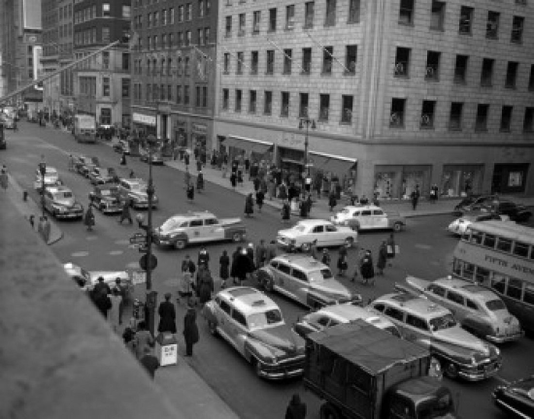 People and cars on streets Canvas Art - (24 x 36)
