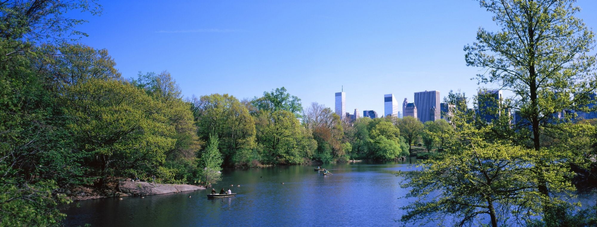 People boating in a lake at a park Central Park Manhattan New York City New York State USA Canvas Art - Panoramic Images (27 x 9)