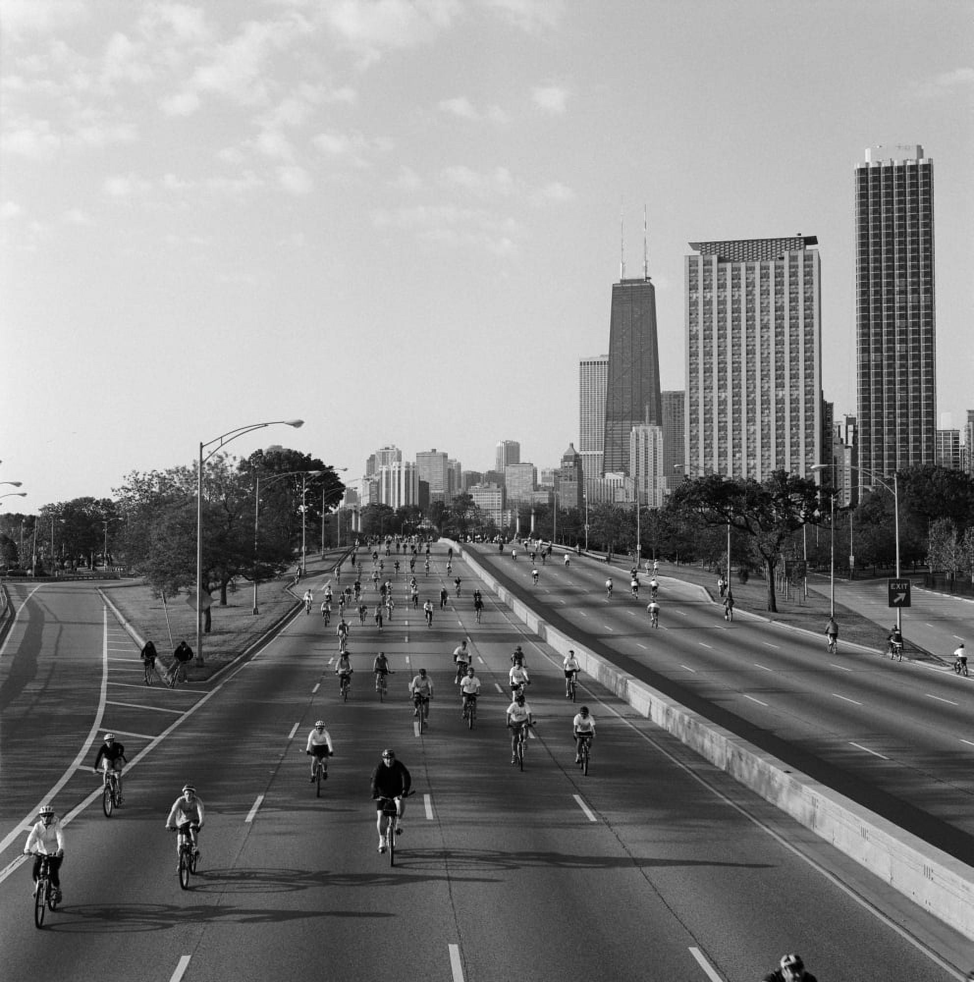 People cycling on a road Bike The Drive Lake shore Drive Chicago Cook County Illinois USA Canvas Art - Panoramic Images (24 x 24)