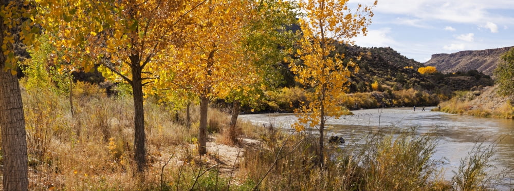 People fishing in the Rio Grande River Orilla Verde Recreation Area Pilar Taos Taos County New Mexico USA Canvas Art - Panoramic Images (27 x 9)
