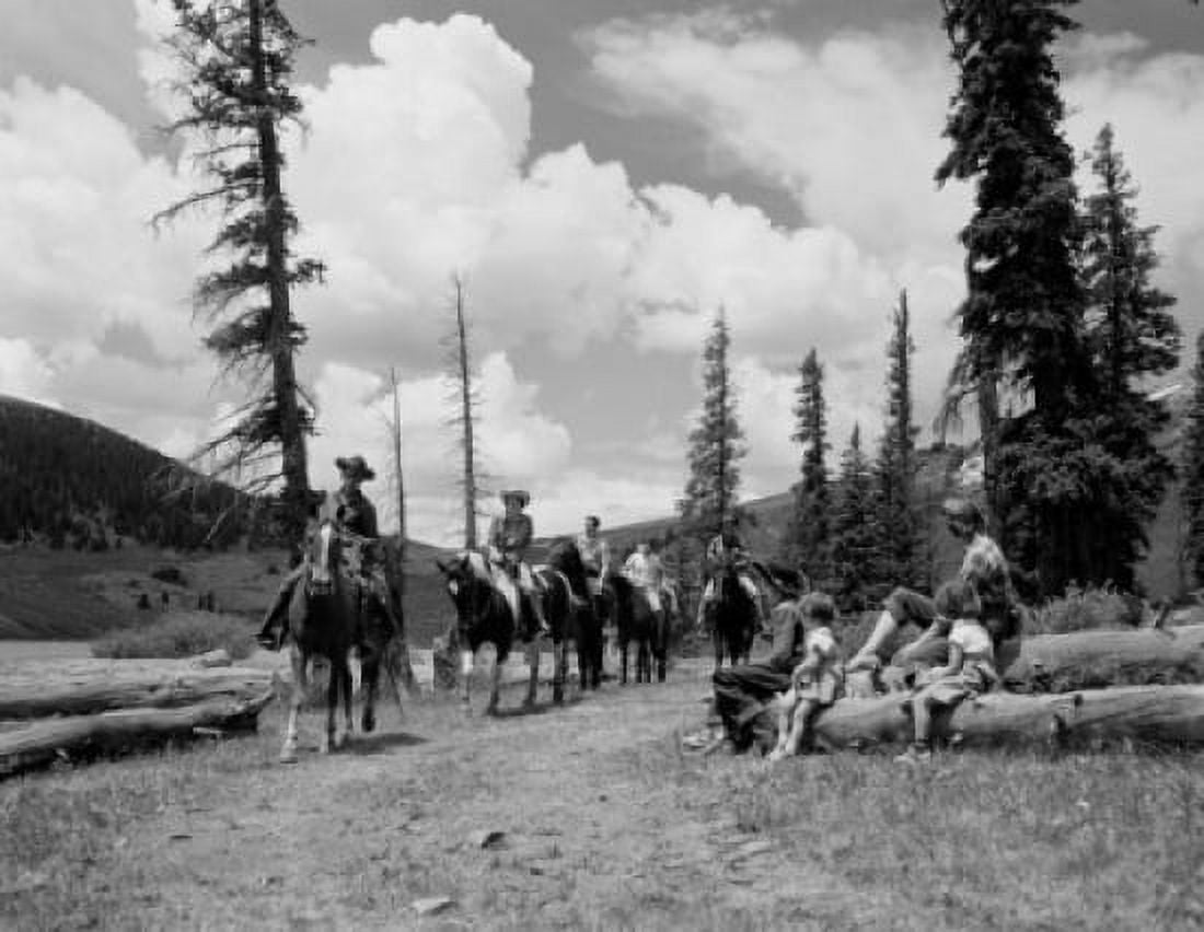 People horseback riding in hilly landscape Canvas Art - (18 x 24)