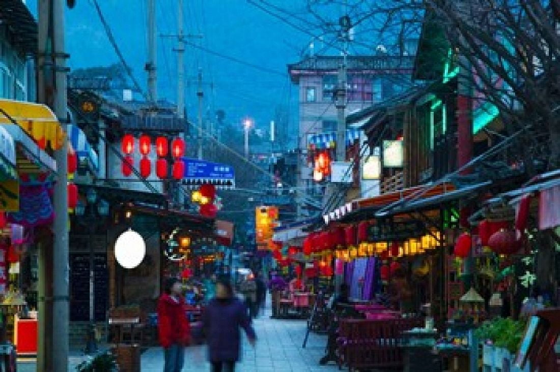 People in a market at the backpacker area around Renmin Lu Old Town Dali Yunnan Province China Canvas Art - Panoramic Images (36 x 24)