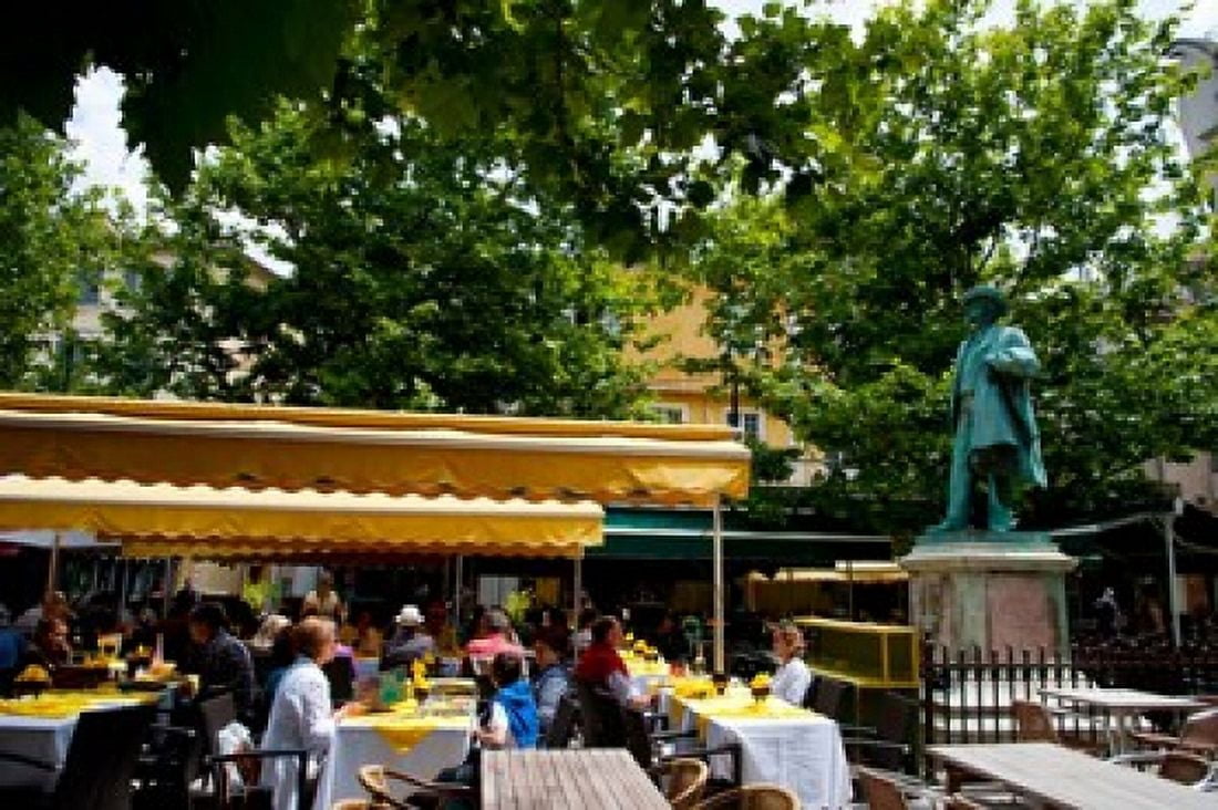 People in a restaurant Place Du Forum Arles Bouches-Du-Rhone Provence-Alpes-Cote dAzur France Canvas Art - Panoramic Images (36 x 24)