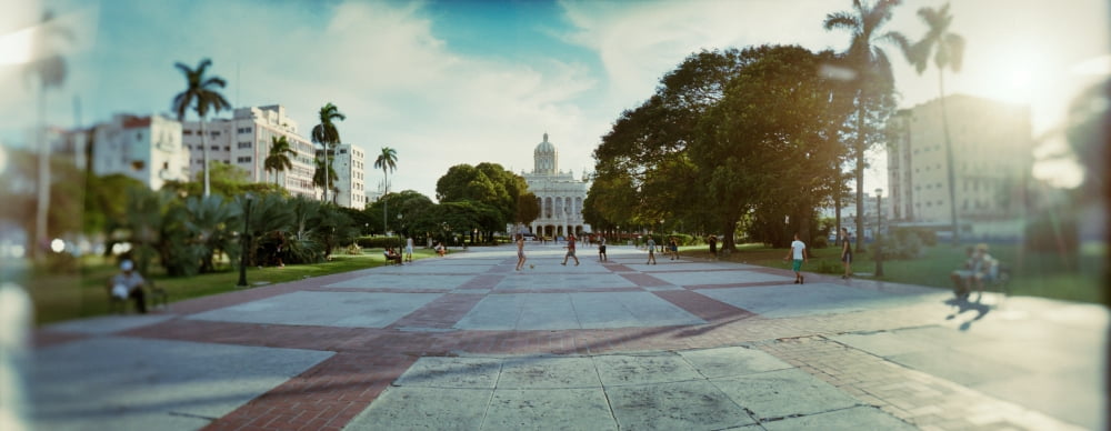 People in the courtyard in front of El Capitolio Havana Cuba Canvas Art - Panoramic Images (12 x 30)