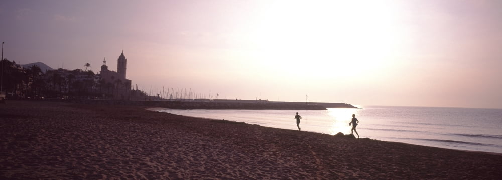 People jogging on beach Sitges Barcelona Catalonia Spain Canvas Art - Panoramic Images (36 x 12)
