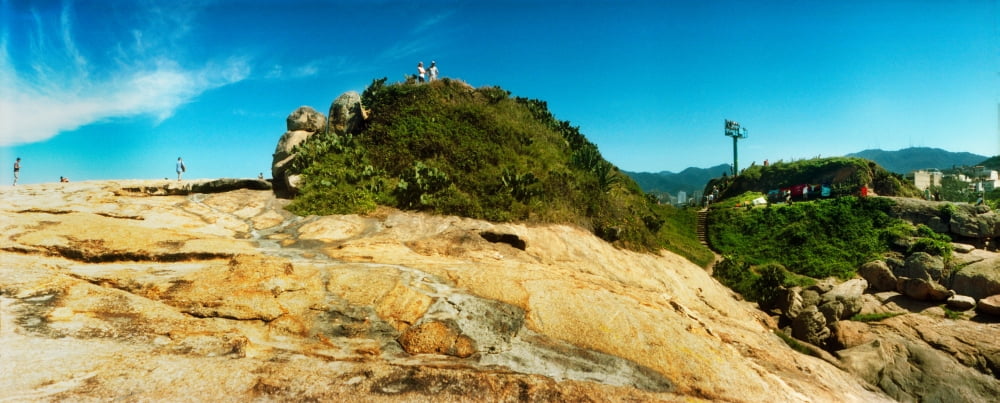 People on boulders that separate Copacabana and Ipanema beach Rio de Janeiro Brazil Canvas Art - Panoramic Images (27 x 9)