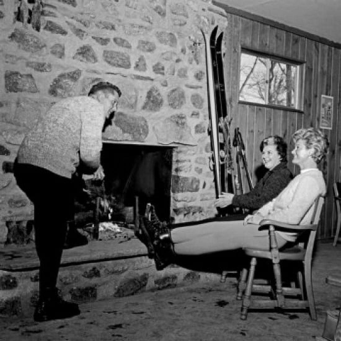 People sitting near fireplace Canvas Art - (24 x 36)