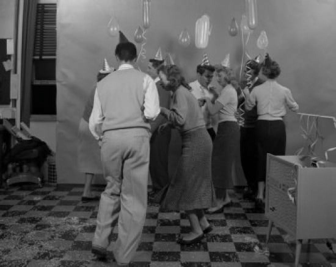 People wearing party hats dancing on party Canvas Art - (18 x 24)
