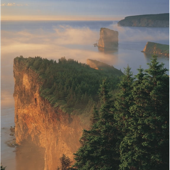 Perce Rock And The Three Sisters In Fog At Sunrise Gaspe Peninsula Quebec Canvas Art - Claude Bouchard Design Pics (24 x 24)