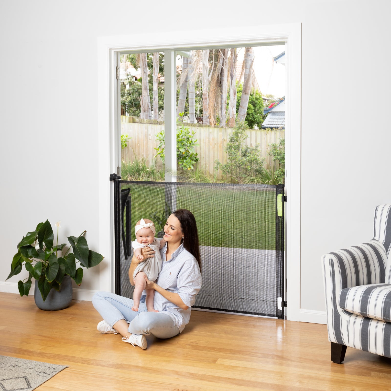 Perma Child Safety 71 in. Wide x 41 in. Tall Black Retractable Baby Gate