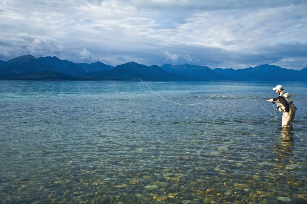 Person Flyfishing In Lake Clark Of Lake Clark National Park Near The Mouth Of Tanalian River In Southcentral Alaska During Summer Canvas Art - Michael DeYoung Design Pics (17 x 11)