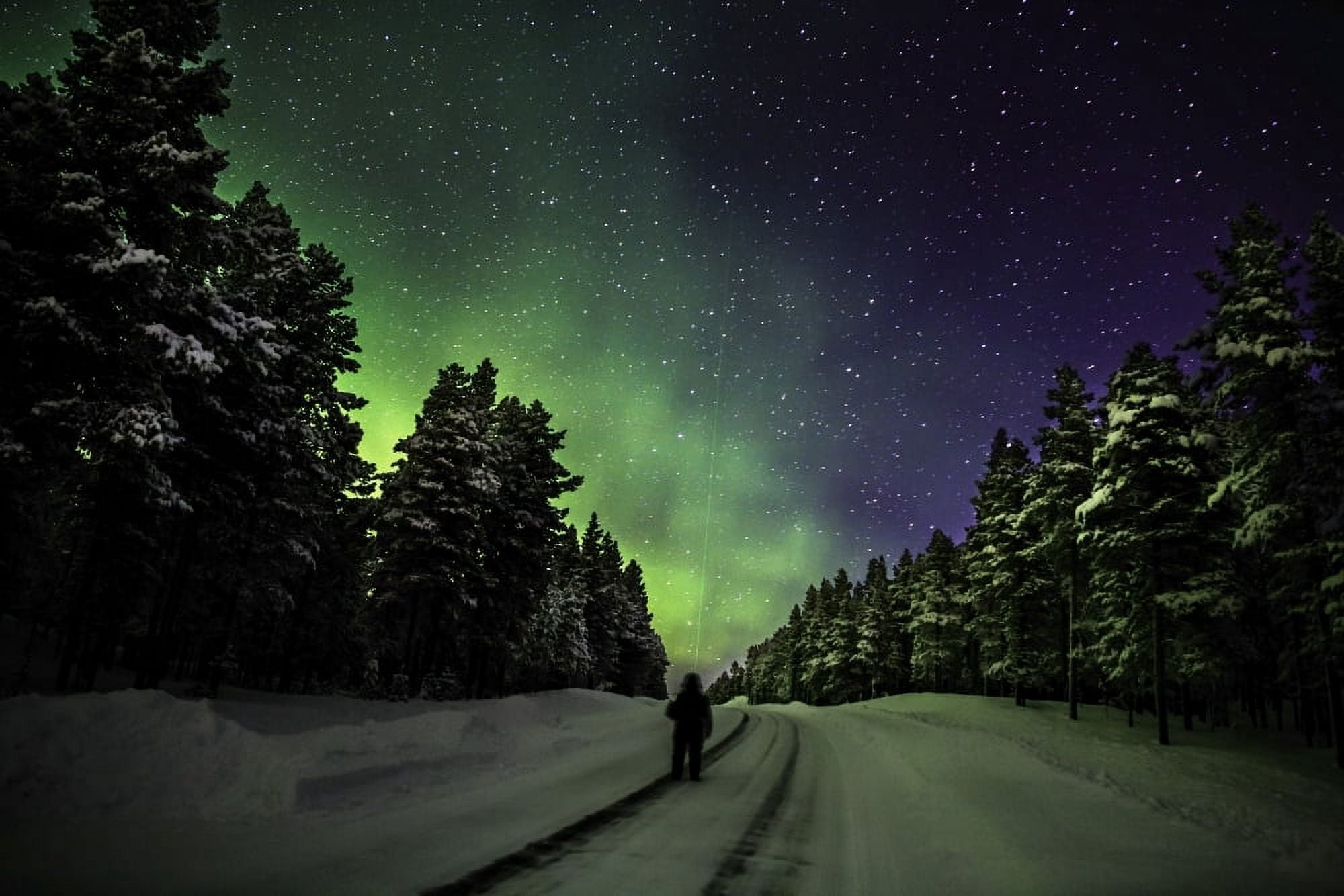 Person enjoying the Aurora Borealis or Northern Lights in extreme cold temperatures -47 Celsius Canvas Art - Panoramic Images (27 x 9)
