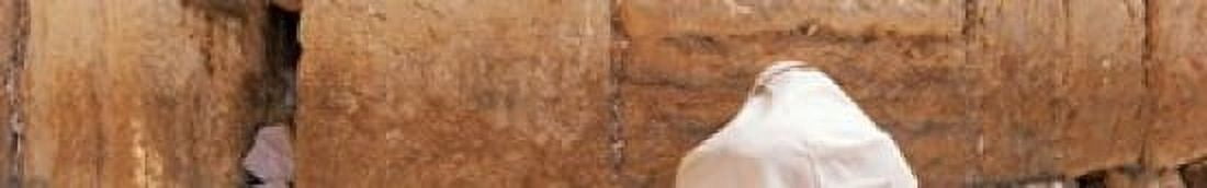 Person praying in front of Western Wall Jerusalem Israel Canvas Art - Panoramic Images (22 x 4)
