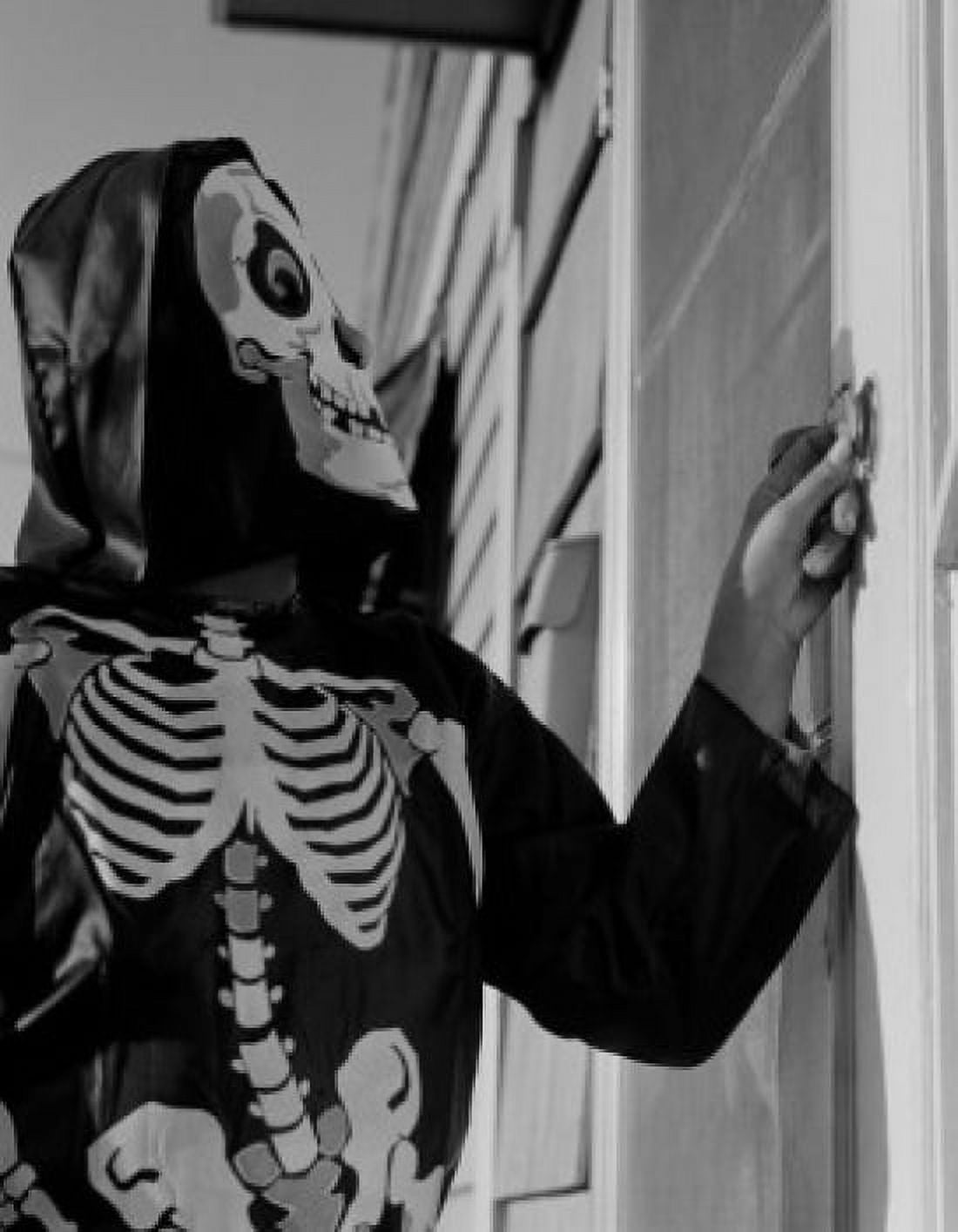 Person ringing doorbell wearing as skeleton Canvas Art - (24 x 36)