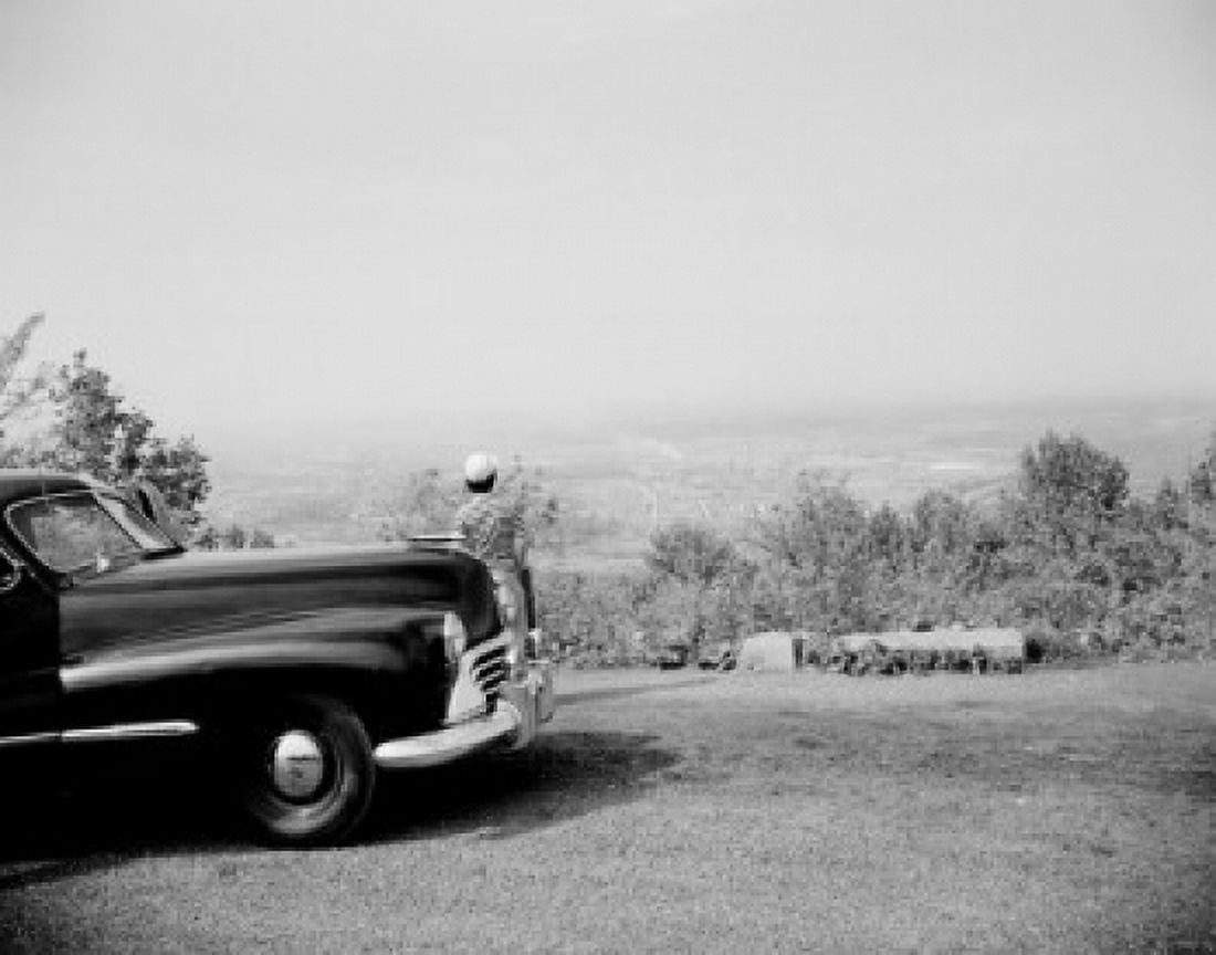 Person standing near car and looking at view Canvas Art - (18 x 24)