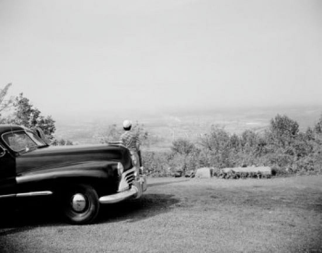 Person standing near car and looking at view Canvas Art - (24 x 36)