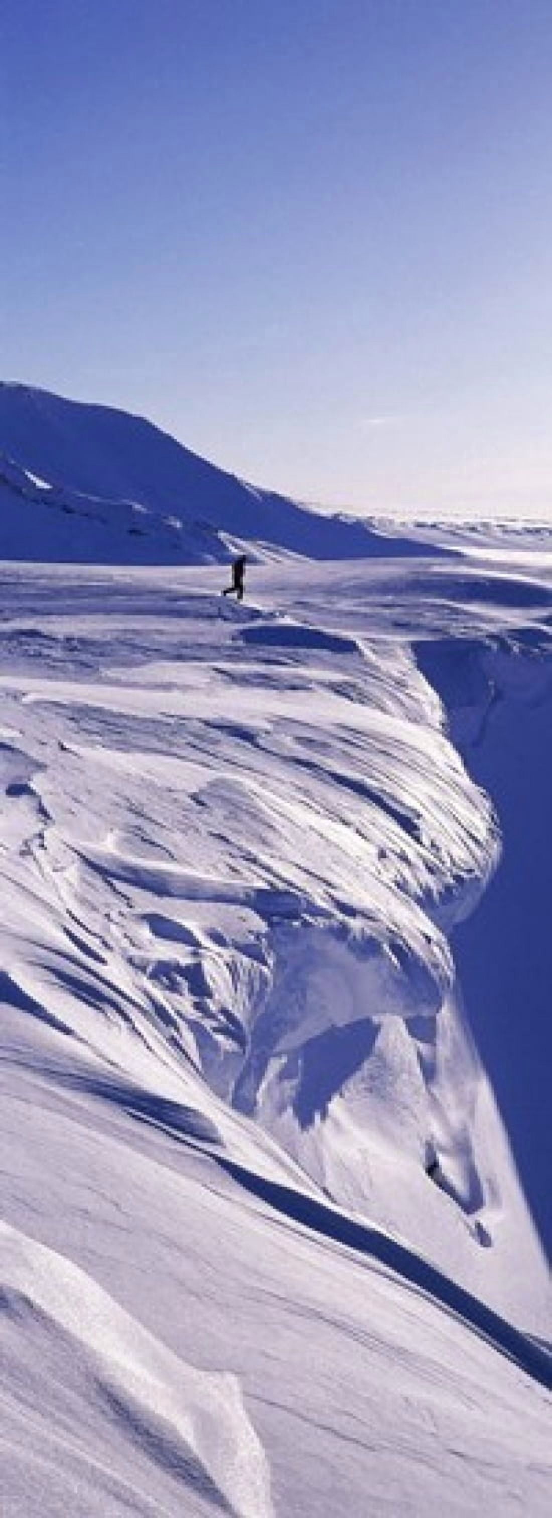 Person walking on a snow covered mountain Snaefellsnes Peninsula Iceland Canvas Art - Panoramic Images (36 x 13)
