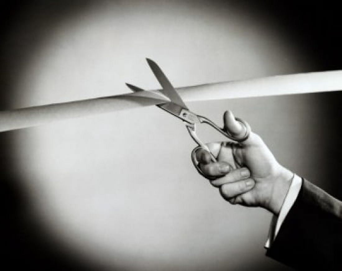 Persons hand cutting a ribbon with a pair of scissors Canvas Art - (24 x 36)