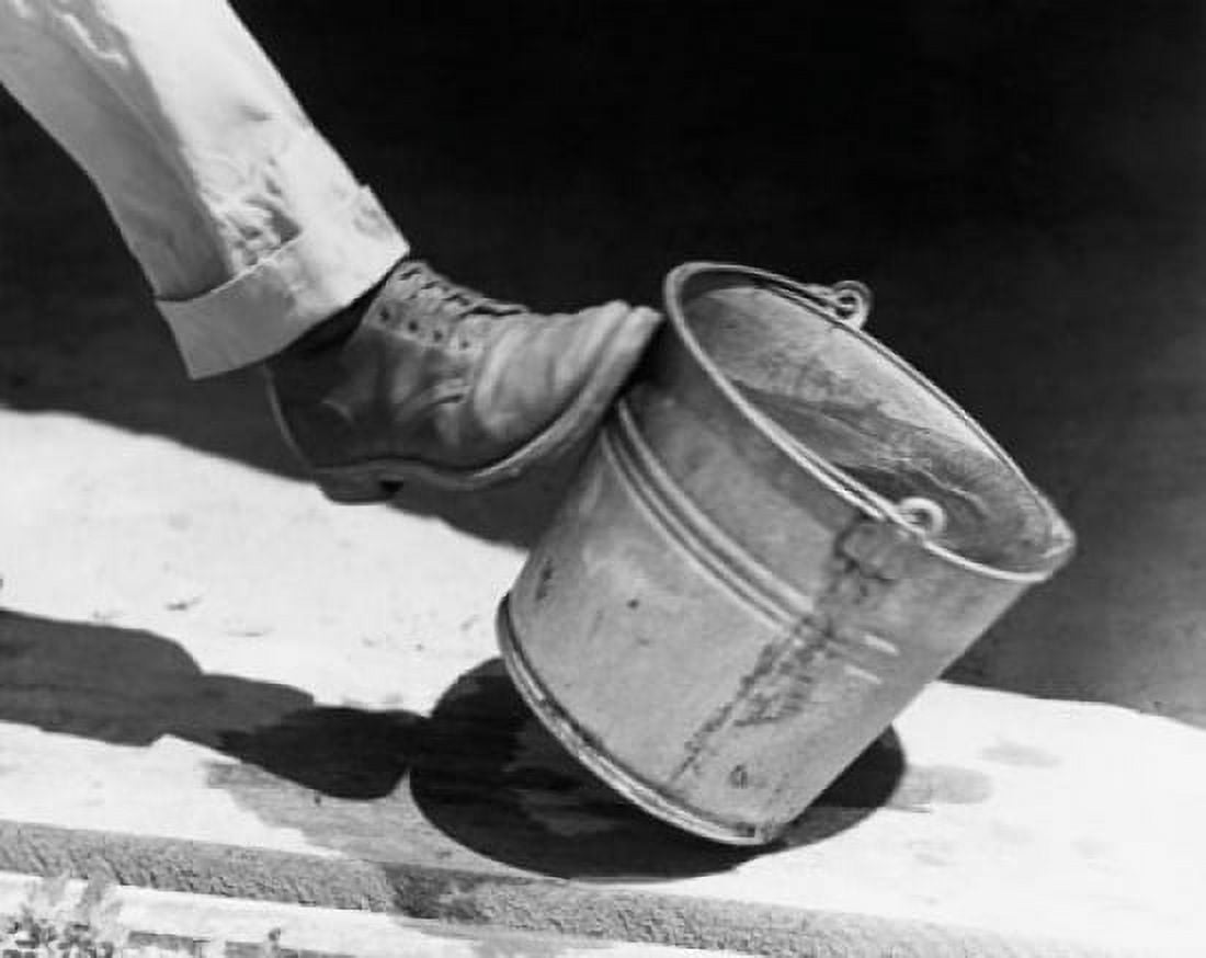 Persons leg kicking a bucket of water Canvas Art - (18 x 24)