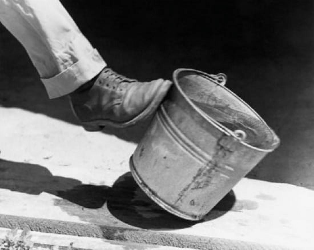 Persons leg kicking a bucket of water Canvas Art - (24 x 36)