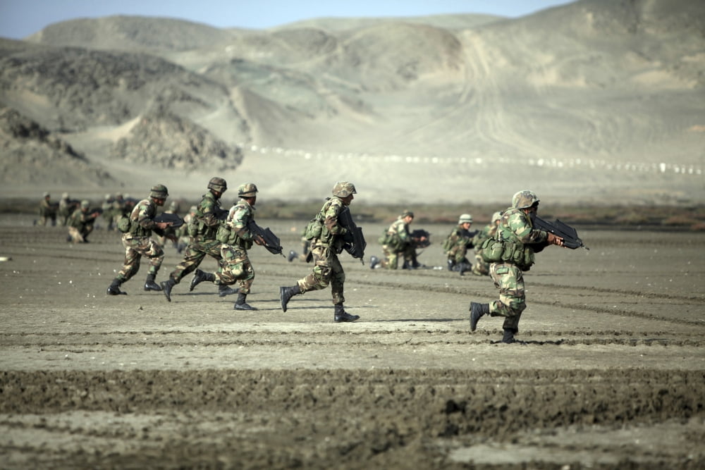 Peruvian Marines and US Marines conduct a beach assault Canvas Art - Stocktrek Images (34 x 23)