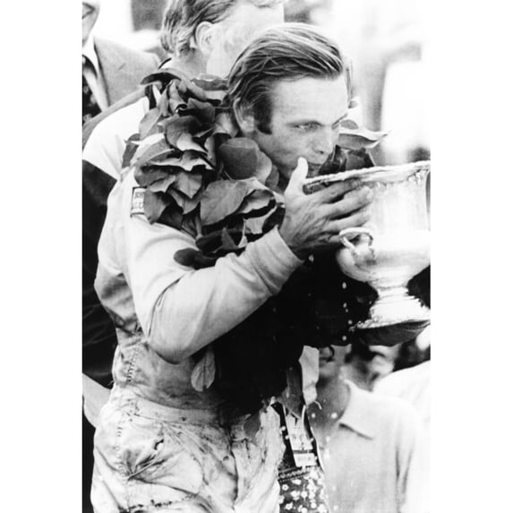 Peter Revson Drinks From His Trophy After Winning The Canadian-American Championship. Watkins Glenn History