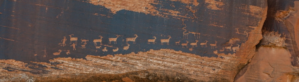 Petroglyphs on rock Hunter Panel Moab Utah USA Canvas Art - Panoramic Images (12 x 42)