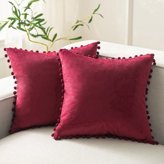 Phantoscope Burgundy Throw Pillow Covers 2 Pack, 22" x 22" Velvet Decorative Pillow Cases with Pom Poms, Soft Square Cushion Covers for Couch Sofa Bed