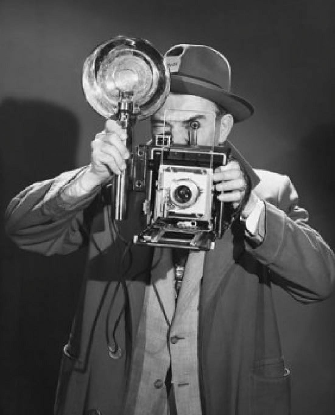 Photographer holding a camera Canvas Art - (18 x 24)