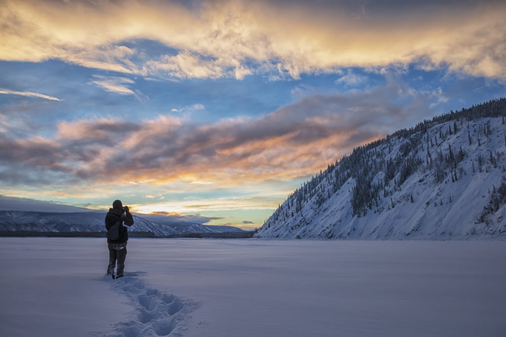 Photographer shooting the sunset over the Yukon River Dawson City Yukon Canada Canvas Art - Robert Postma Design Pics (19 x 12)