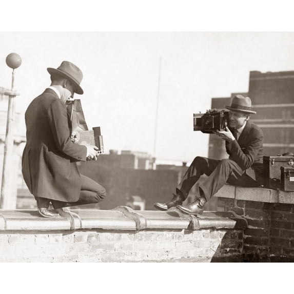 Photographers C1920. Ntwo Photographers Taking Each Other'S Picture While Perched On A Roof. Photograph C1920. Print