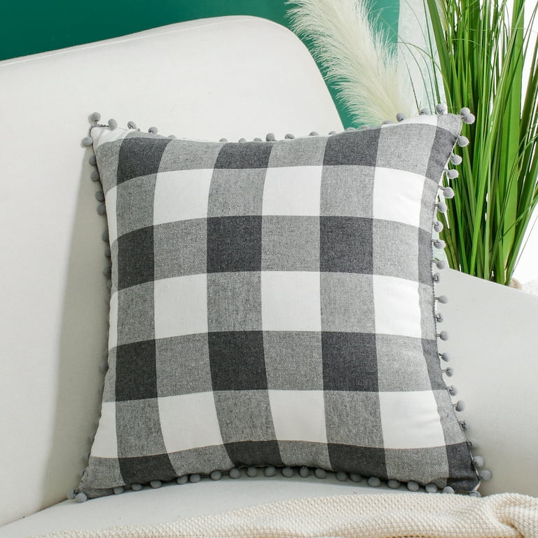 Gray and top white plaid pillows