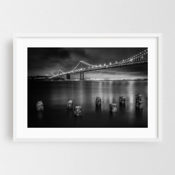 Pier Pilings & the San Francisco - Oakland Bay Bridge B&W - San Francisco California Photography White Framed Wall Art Print 24 x 36 inches