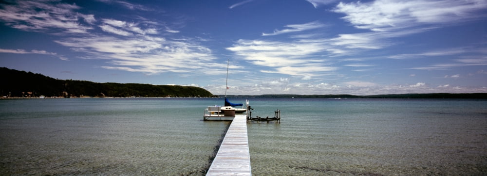Pier at a lake Crystal Lake Frankfort Benzie County Michigan USA Canvas Art - Panoramic Images (36 x 12)