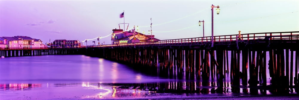 Pier illuminated at dusk Stearns Wharf Santa Barbara California USA Canvas Art - Panoramic Images (12 x 36)