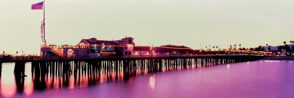 Pier illuminated at dusk Stearns Wharf Santa Barbara California USA Canvas Art - Panoramic Images (6 x 18)