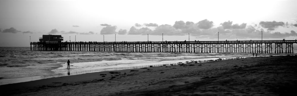 Pier in an ocean Newport Pier Newport Beach Orange County California USA Canvas Art - Panoramic Images (6 x 18)