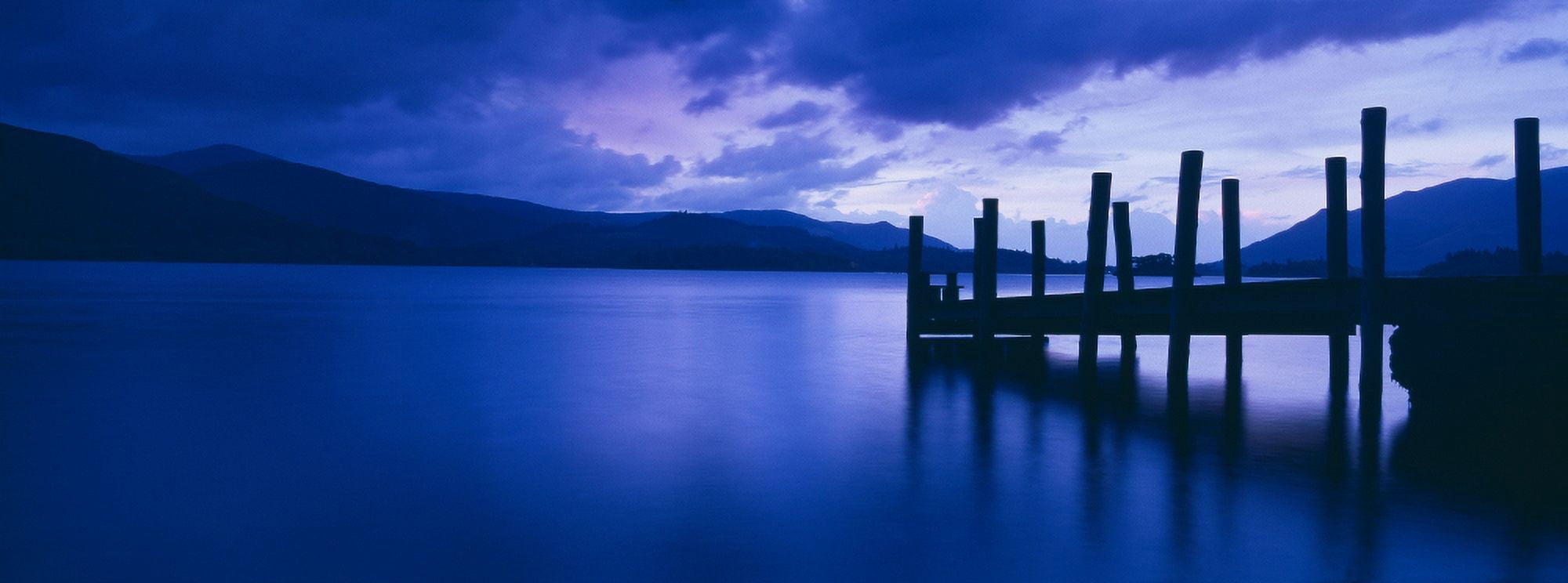 Pier on a lake Derwentwater Lake District Lake District National Park England Canvas Art - Panoramic Images (27 x 9)