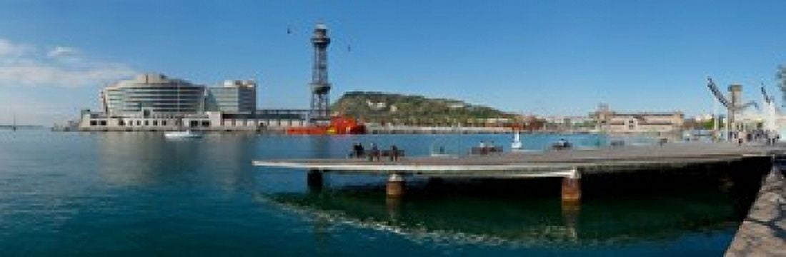 Pier on the sea with World Trade Centre in the background Port Vell Barcelona Catalonia Spain Canvas Art - Panoramic Images (18 x 6)