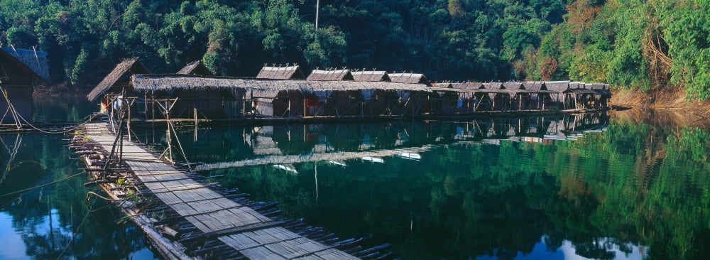 Pier over a lake Chiaw Lan Lake Kao Sok National Park Thailand Canvas Art - Panoramic Images (36 x 12)
