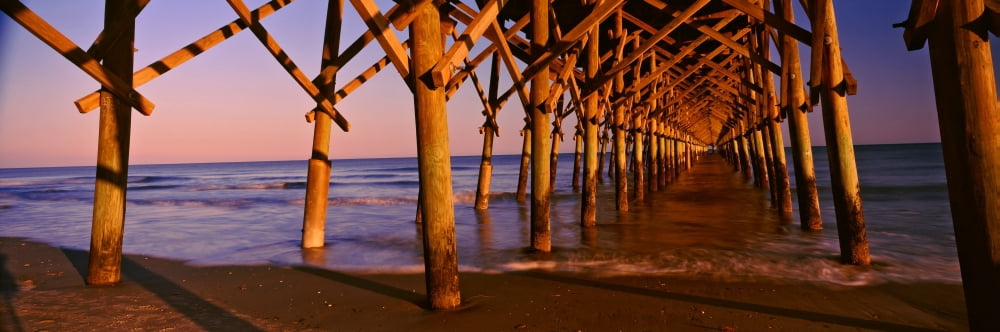 Pier over the ocean Folly Beach Fishing Pier Folly Beach Folly Island Charleston County South Carolina USA Canvas Art - Panoramic Images (27 x 9)